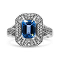 .925 Sterling Silver Diamond Accent and 8X6 mm Emerald-Shape Blue Topaz Ring (I-J Color, I2-I3 Clarity) - Ring Size 7