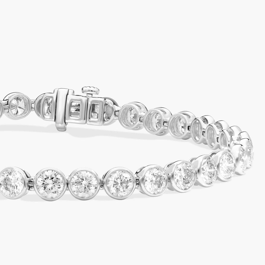 10 CTW Bezel Set Created Moissanite Tennis Bracelet in 14Kt Gold Plated – Round Cut, 7 Inch - LUXGRIAL