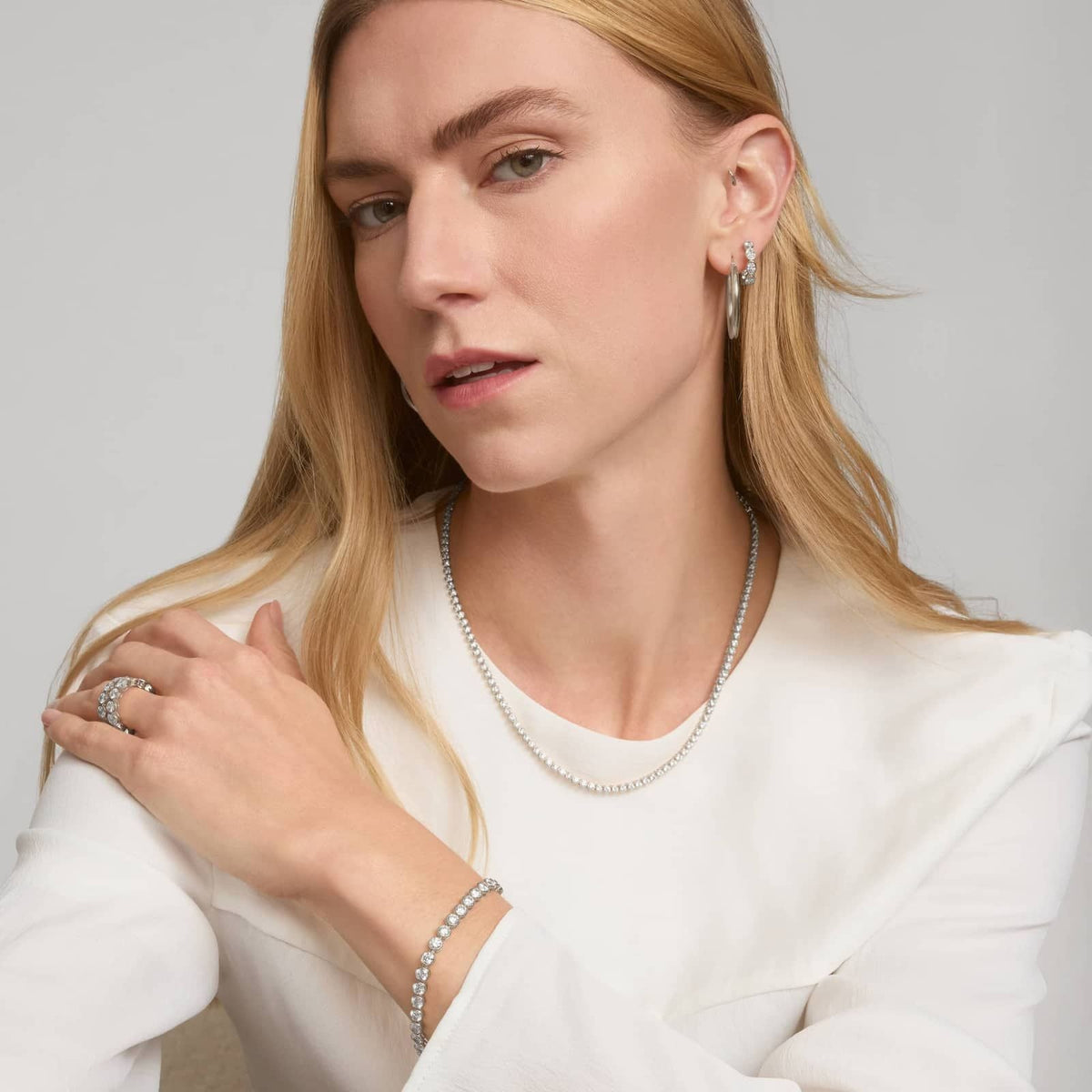 10 CTW Bezel Set Created Moissanite Tennis Bracelet in 14Kt Gold Plated – Round Cut, 7 Inch - LUXGRIAL
