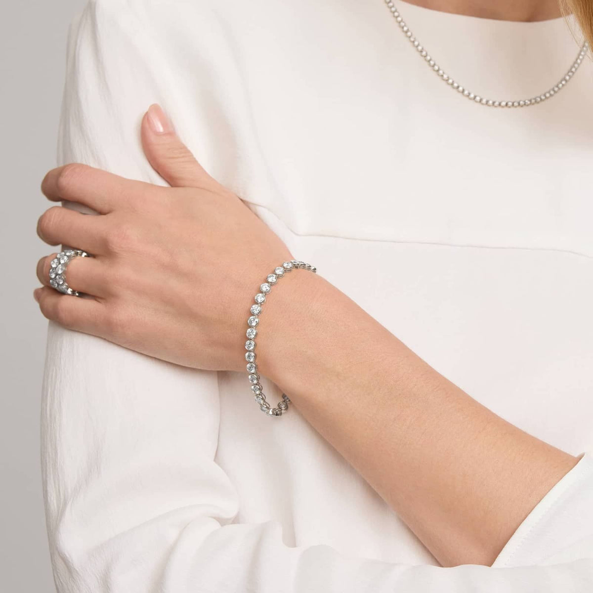 10 CTW Bezel Set Created Moissanite Tennis Bracelet in 14Kt Gold Plated – Round Cut, 7 Inch - LUXGRIAL